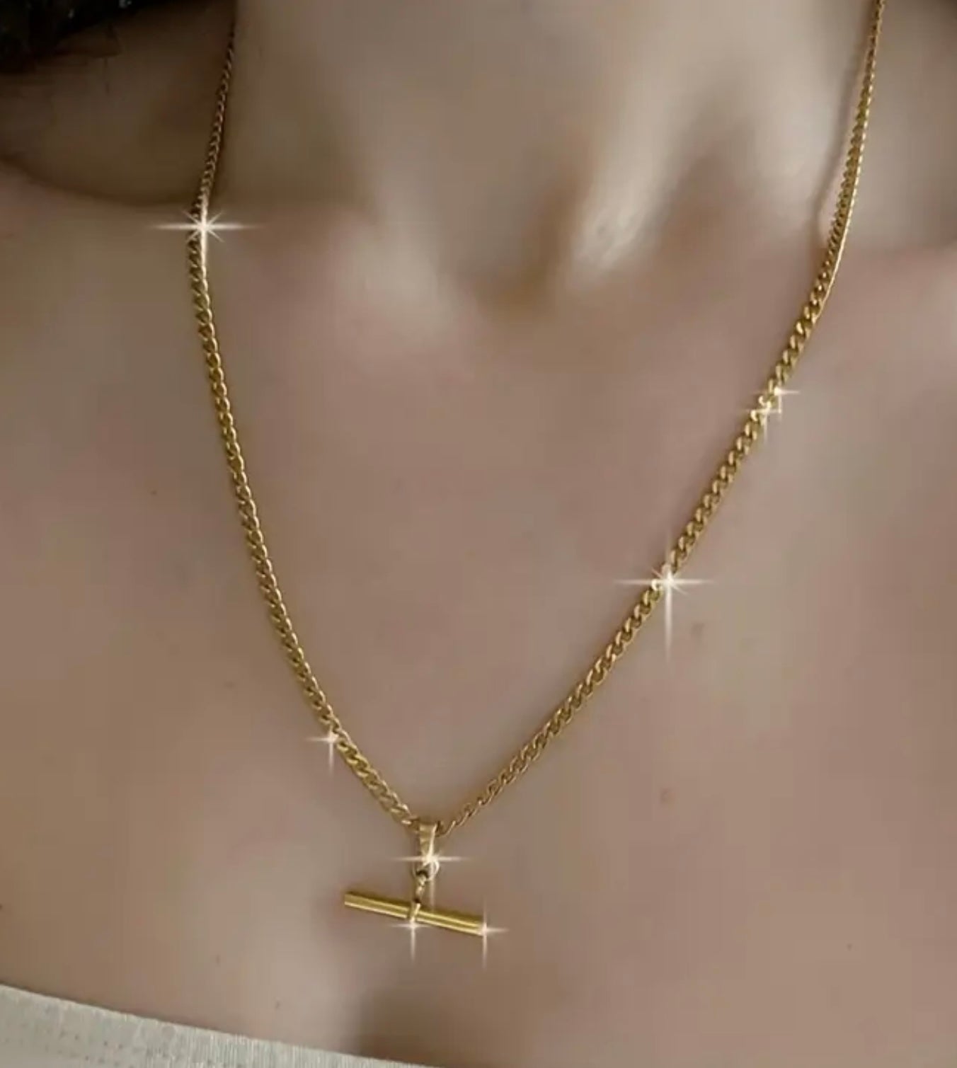 Flying Saucers gold bar pendant