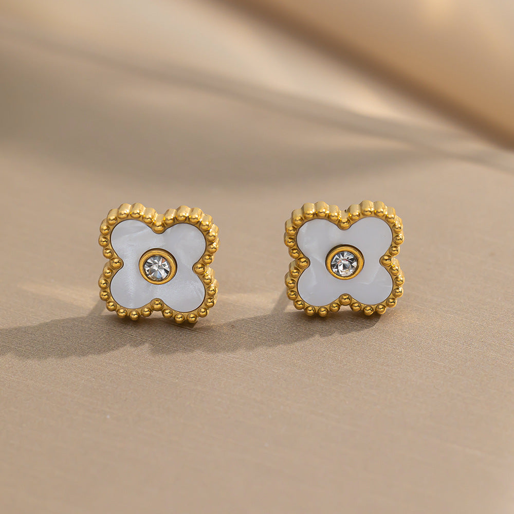 Flying Saucers 4 leaf clover stud earrings white