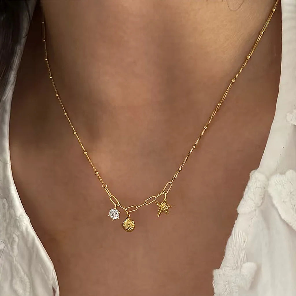 Flying Saucers Shell and starfish charm necklace