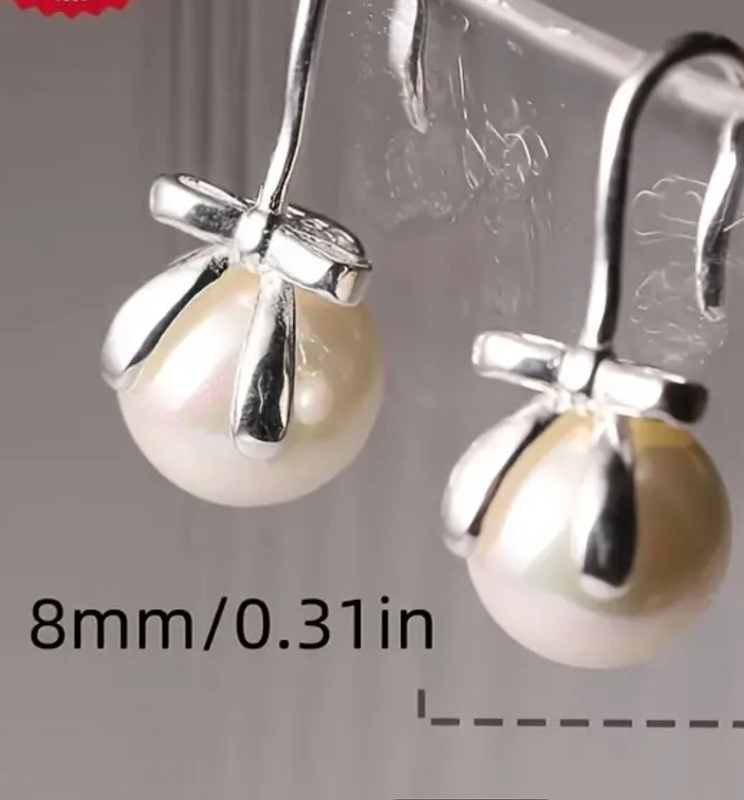 Flying Saucers s/silver bow and pearl Earrings