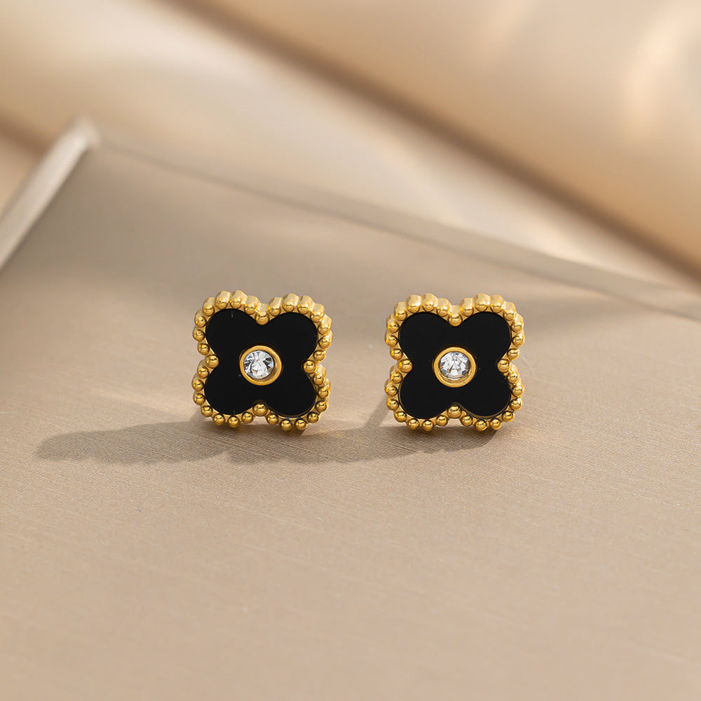 Flying Saucers 4 leaf clover stud earrings black