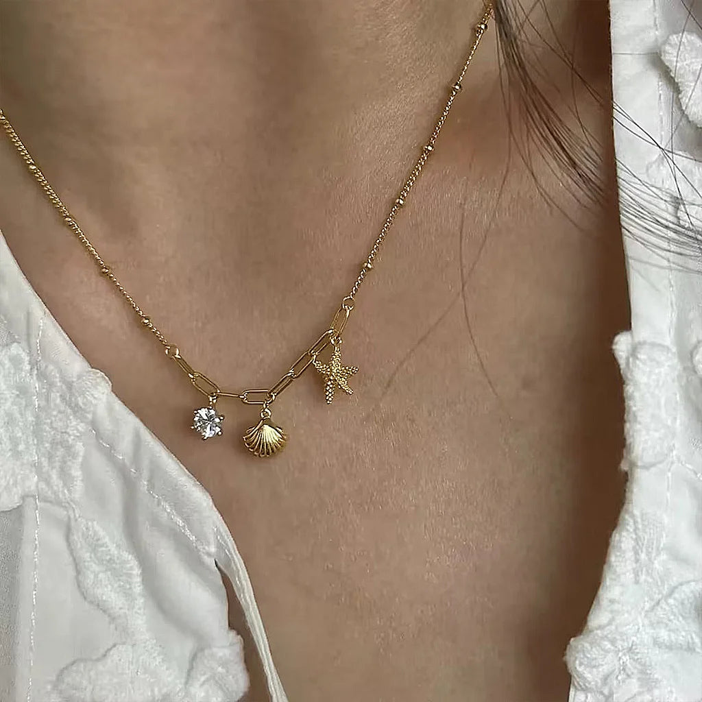 Flying Saucers Shell and starfish charm necklace
