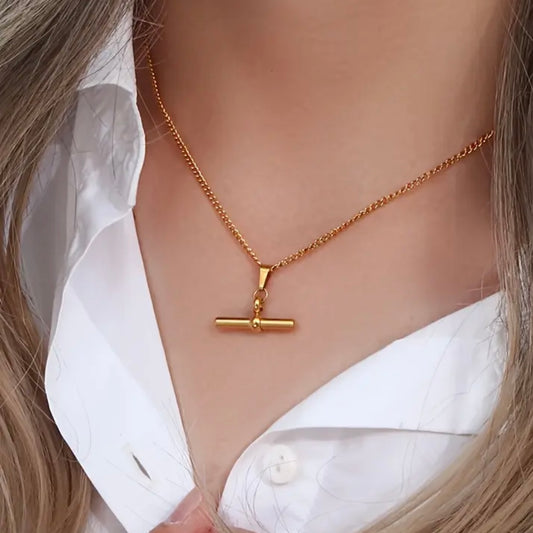 Flying Saucers gold bar pendant