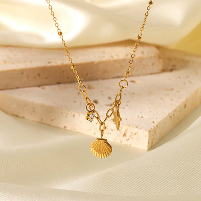Flying Saucers Shell and starfish charm necklace