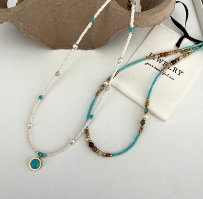 Flying Saucers Color: Titanium Steel Turquoise Natural Stone Chain