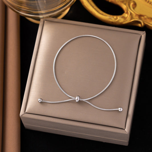 Flying Saucers tie bracelet silver