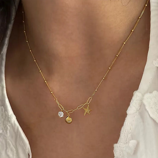 Flying Saucers Shell and starfish charm necklace