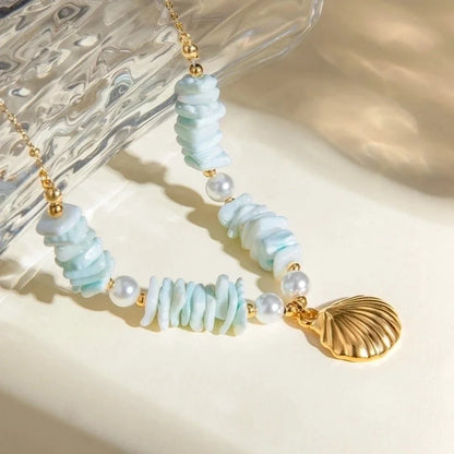 Flying Saucers star shell necklace Aqua